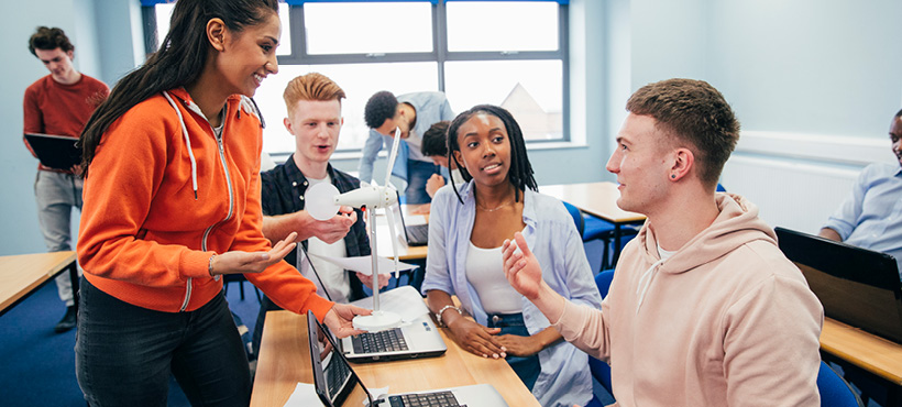 Students chatting with each other in a classroom