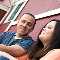 Two people sitting down and chatting