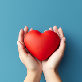 Person holding a loveheart