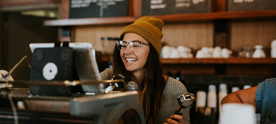 female barista smiling